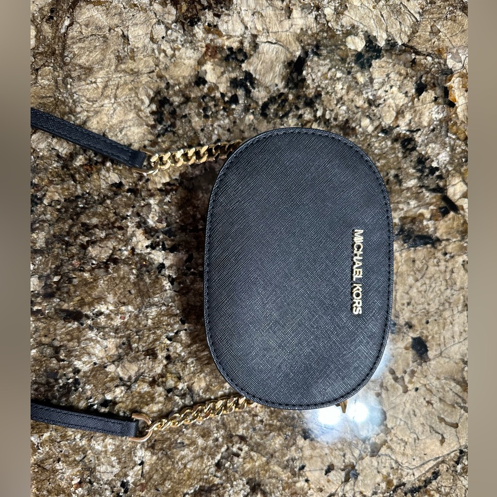 Micheal Kors cross body purse.